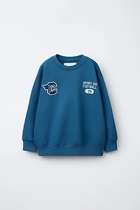 TEXT JOGGING SWEATSHIRT