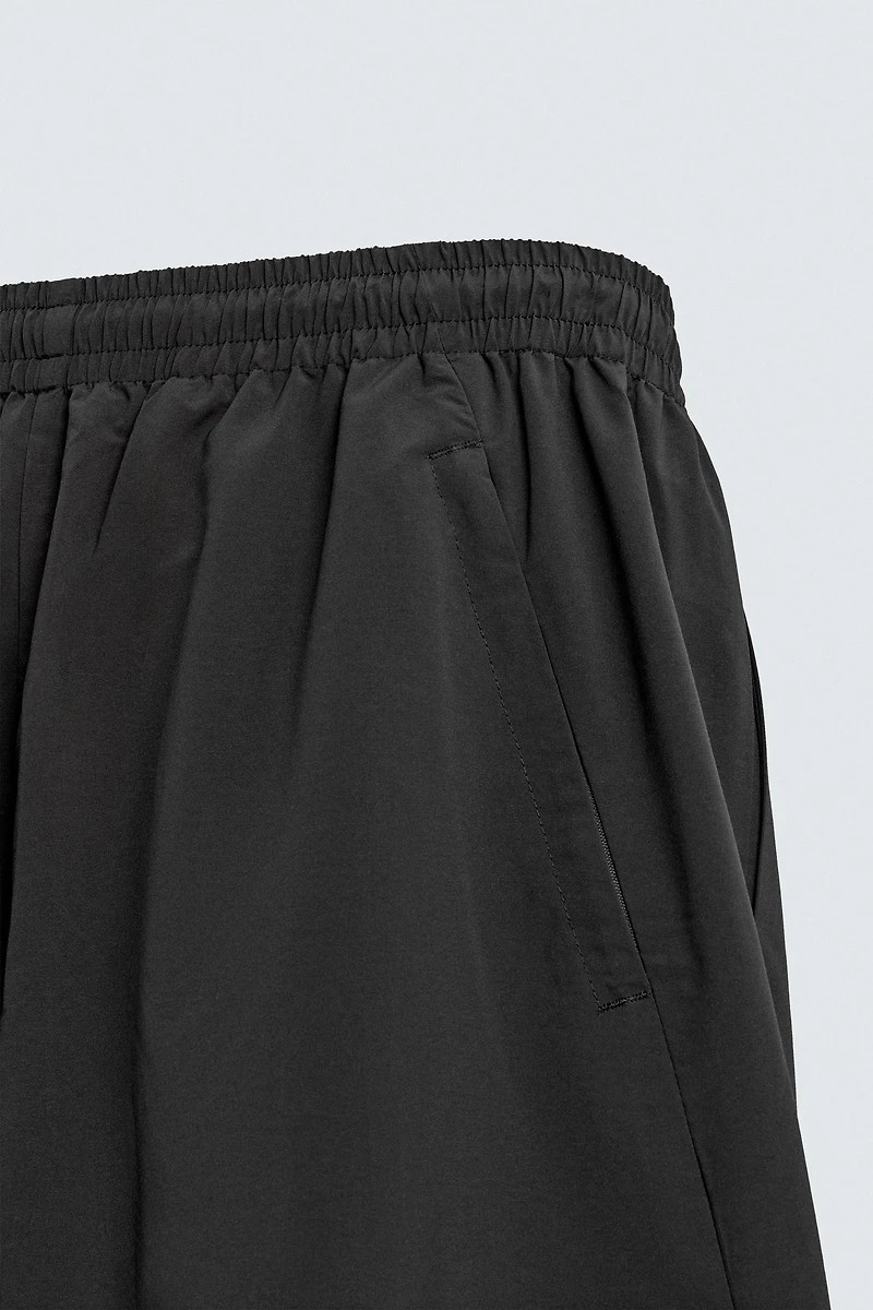TECHNICAL PANTS WITH STRIPES