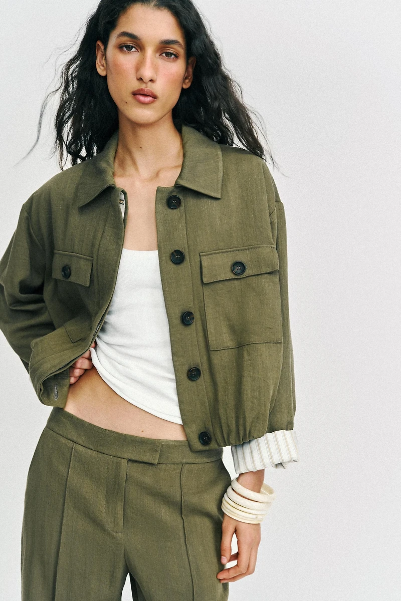 SHORT JACKET WITH ROLLED-UP SLEEVES