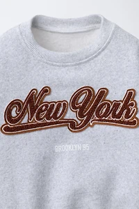 EMBROIDERED TERRY TEXT SWEATSHIRT