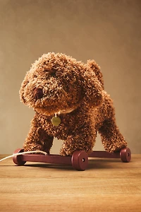 CHILDREN'S PLUSH TOY DOG WITH WHEELS