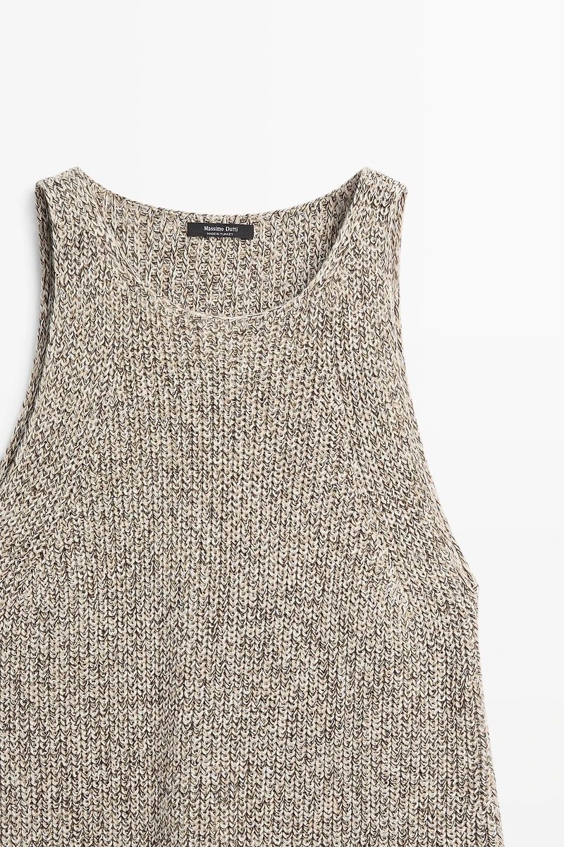 Top asymétrique en maille
