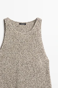 Top asymétrique en maille