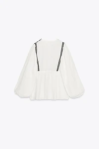 VESTE BRODERIES CONTRASTANTES
