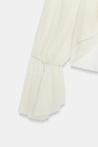 SEMI-SHEER RUFFLED TOP