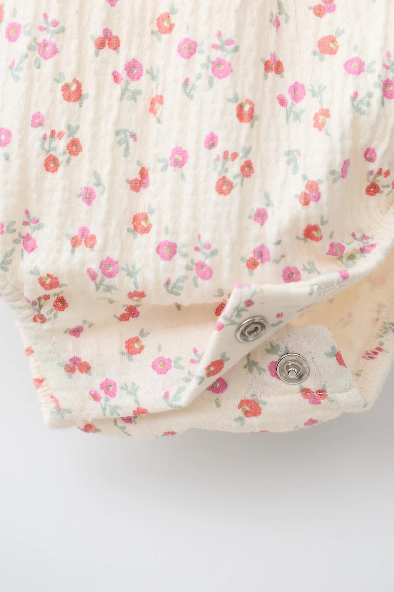 TEXTURED FLORAL BODYSUIT
