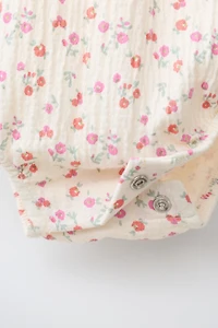 TEXTURED FLORAL BODYSUIT