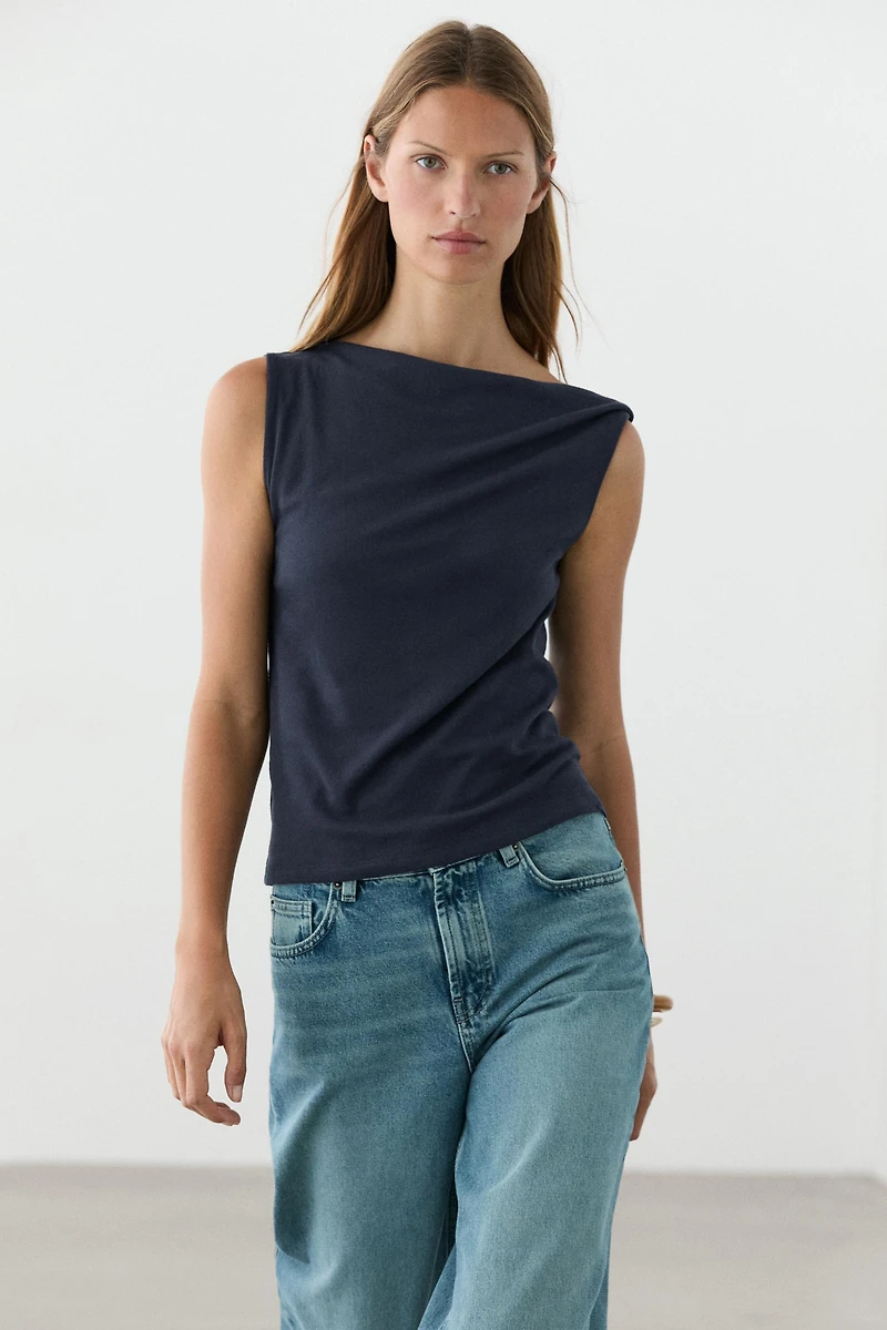 Asymmetric drop sleeve top