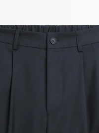 Relaxed fit wool blend trousers with darts