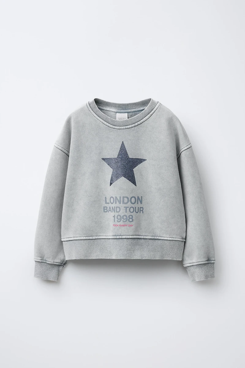 SWEAT EFFET DÉLAVÉ ÉTOILE BRILLANT