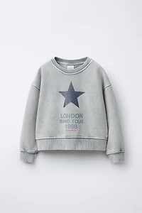 SWEAT EFFET DÉLAVÉ ÉTOILE BRILLANT