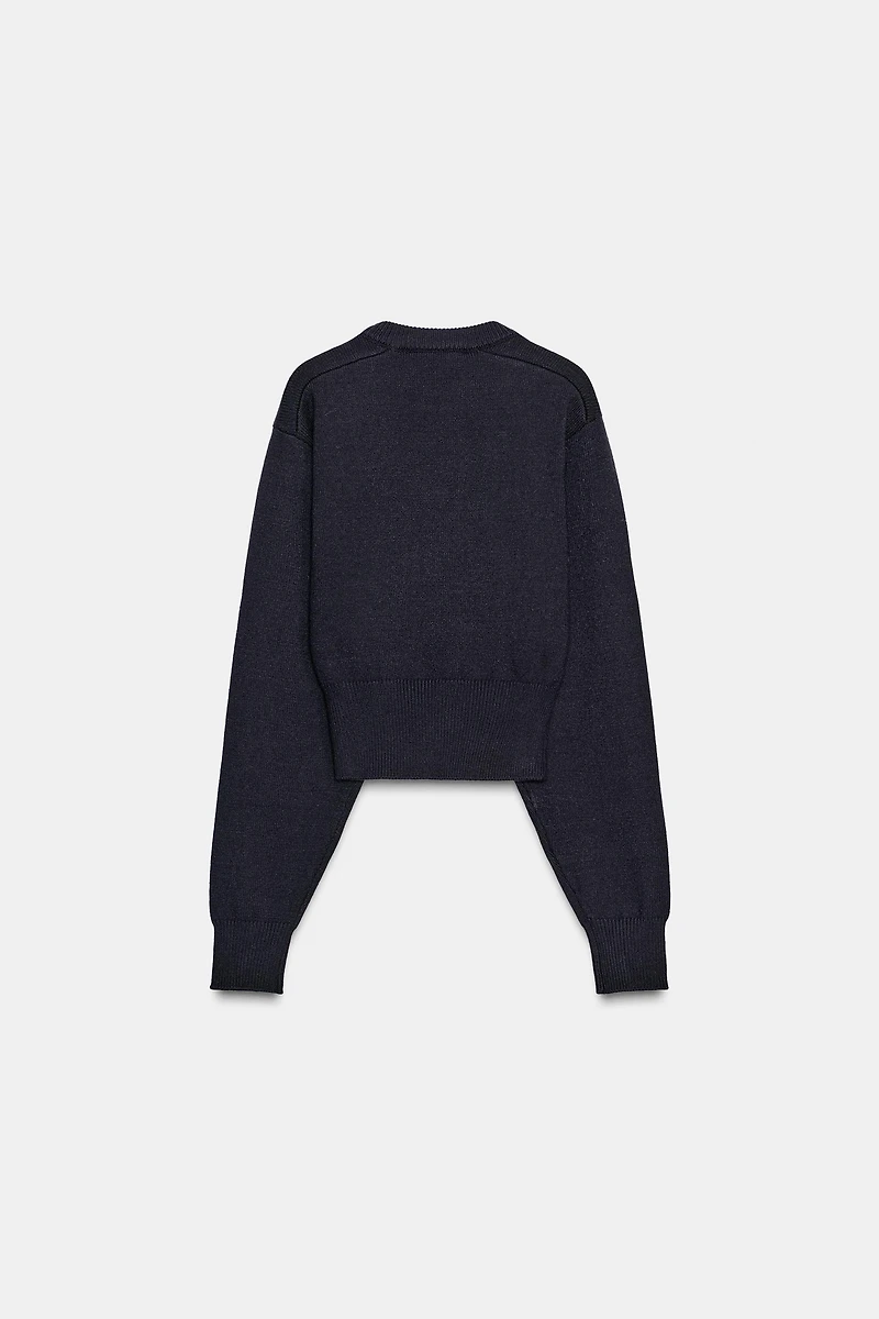 PULL COURT EN MAILLE UNIE
