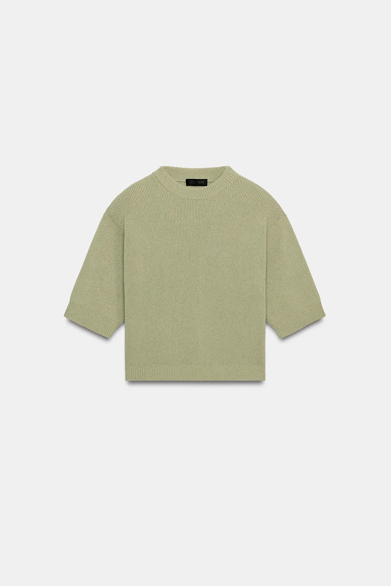 PULL EN MAILLE AVEC ÉPAULETTES