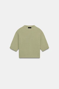PULL EN MAILLE AVEC ÉPAULETTES