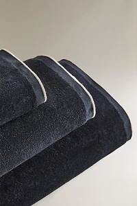 VELOUR OVERLOCK BATH TOWEL