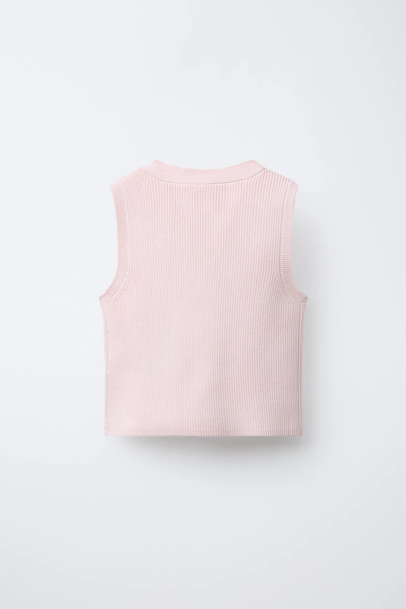 GILET EN MAILLE À NŒUDS