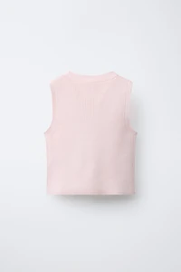 GILET EN MAILLE À NŒUDS