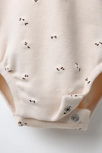 WARM FLORAL BODYSUIT