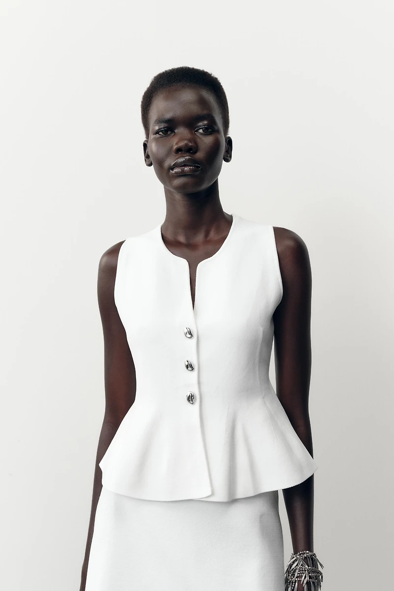 TOP EN MAILLE PÉPLUM