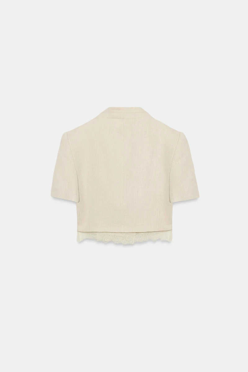VESTE COURTE À BORDURE DENTELLE