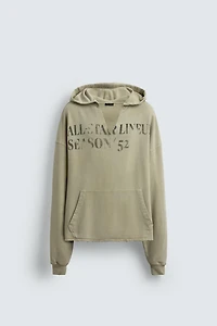 SWEAT DÉLAVÉ À INSCRIPTION IMPRIMÉE
