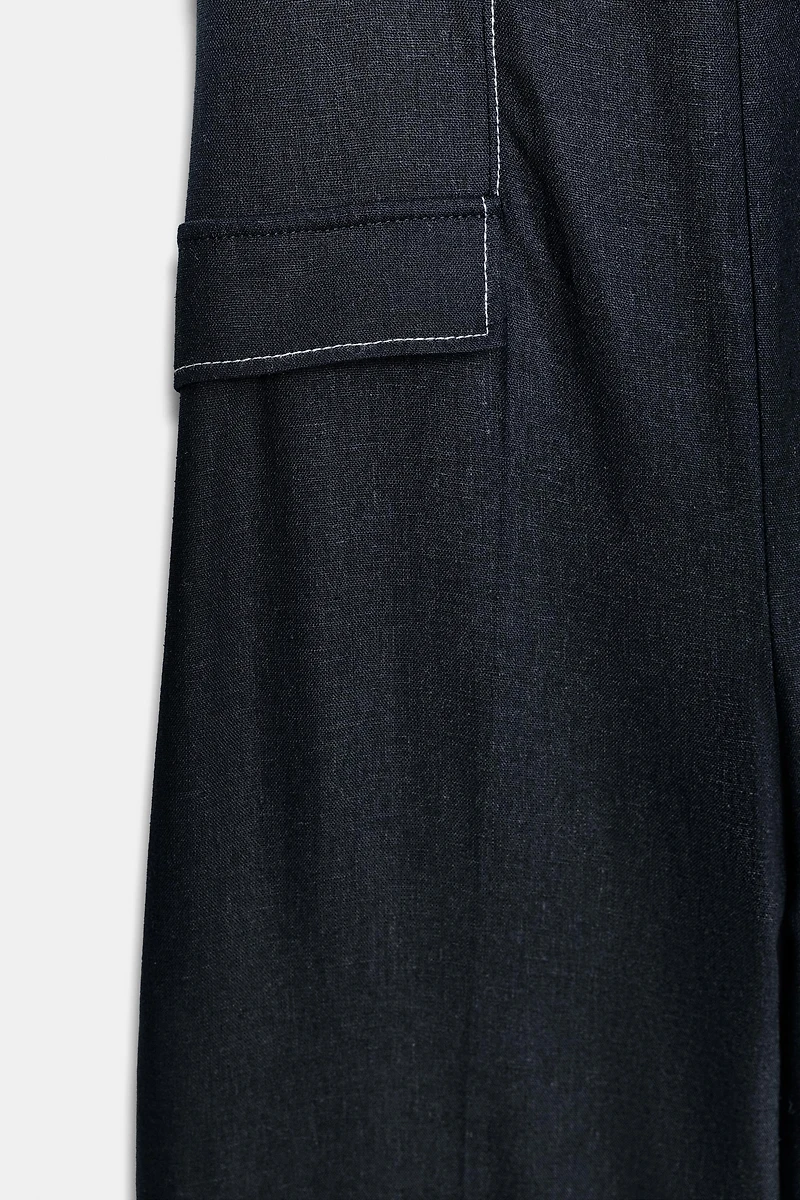 LINEN HALTER JUMPSUIT WITH CONTRAST TOPSTITCHING