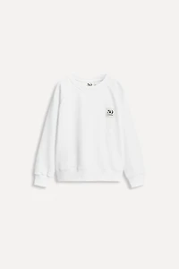 6 ANS/ SWEAT POCHE ÉTIQUETTE 50TH ANNIVERSARY