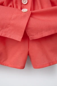 BUTTON SKORT