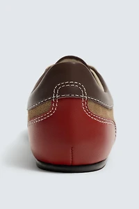 BASKETS EN CUIR HARRY LAMBERT FOR ZARA X DISNEY