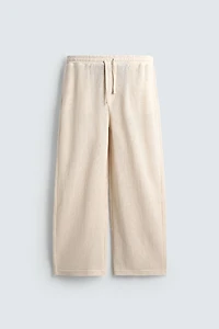 PANTALON COUPE DÉCONTRACTÉE STRUCTURE OUVERTE