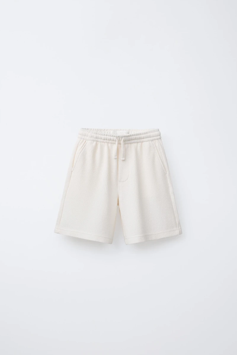 SLIM FIT TEXTURED TOWEL SHORTS