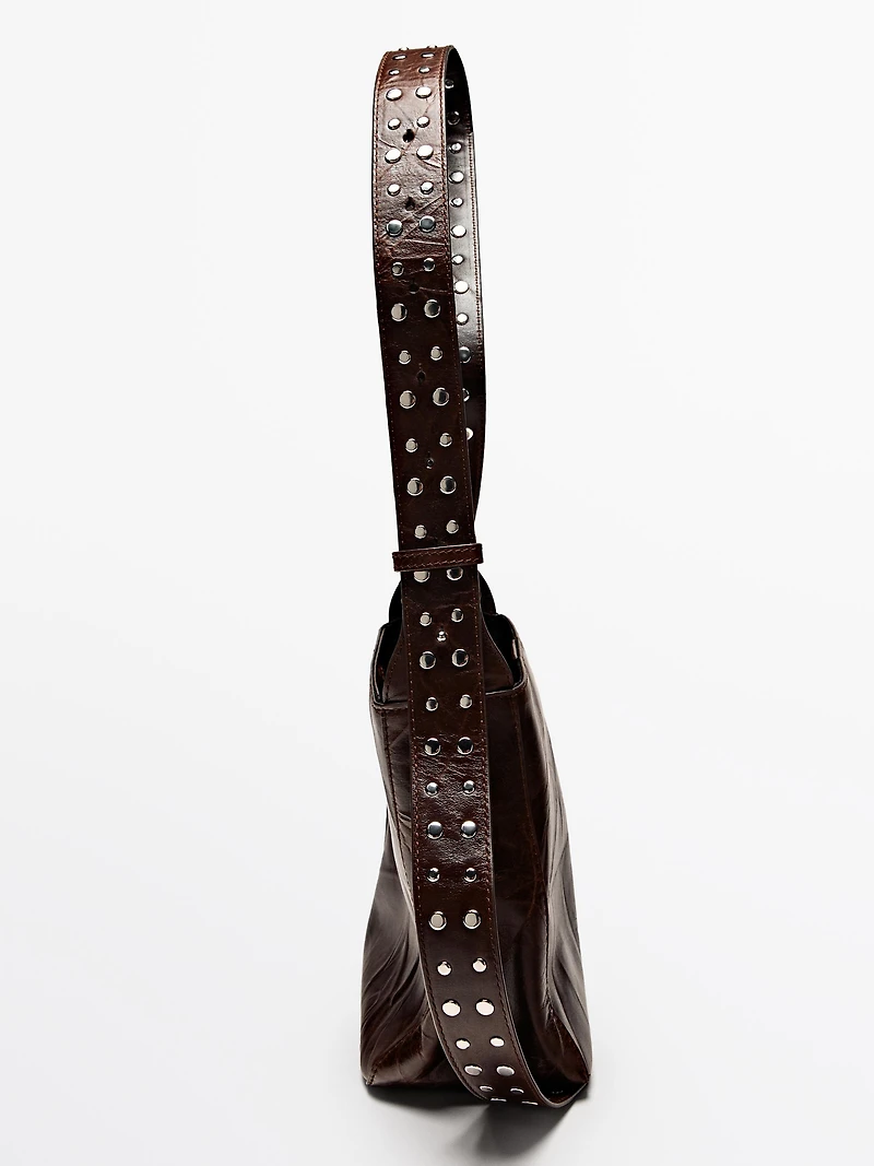 Nappa leather bucket bag with studs