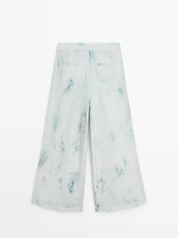 Printed trousers with pleat details