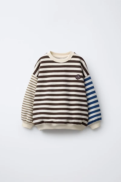 STRIPED SWEATSHIRT WITH FACE PATCH