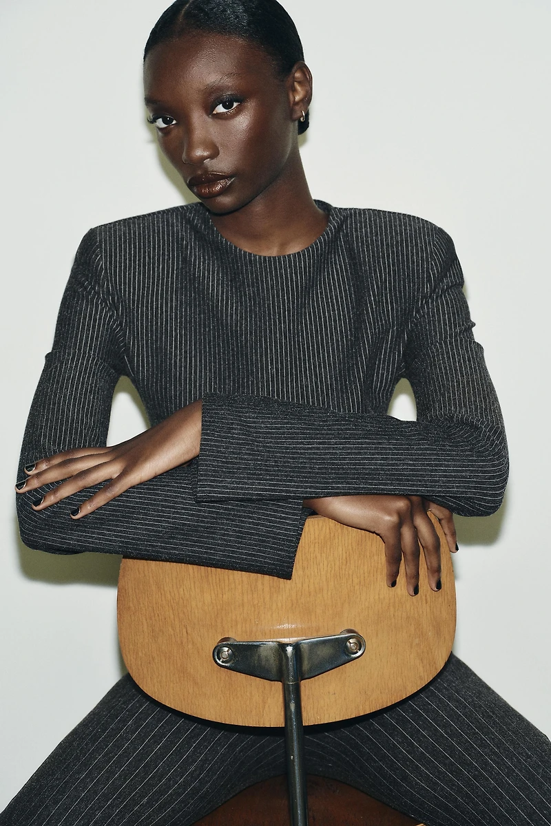 PINSTRIPED SHOULDER PAD TOP