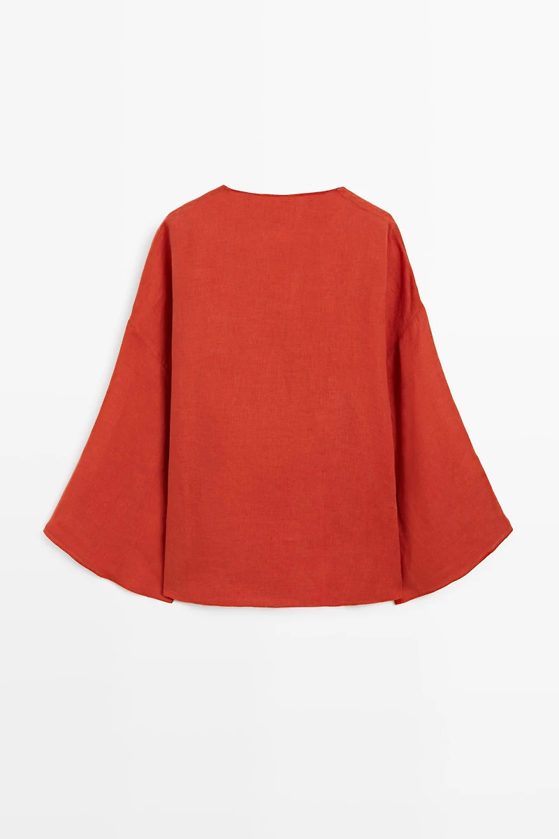 Flowing 100% linen surplice blouse