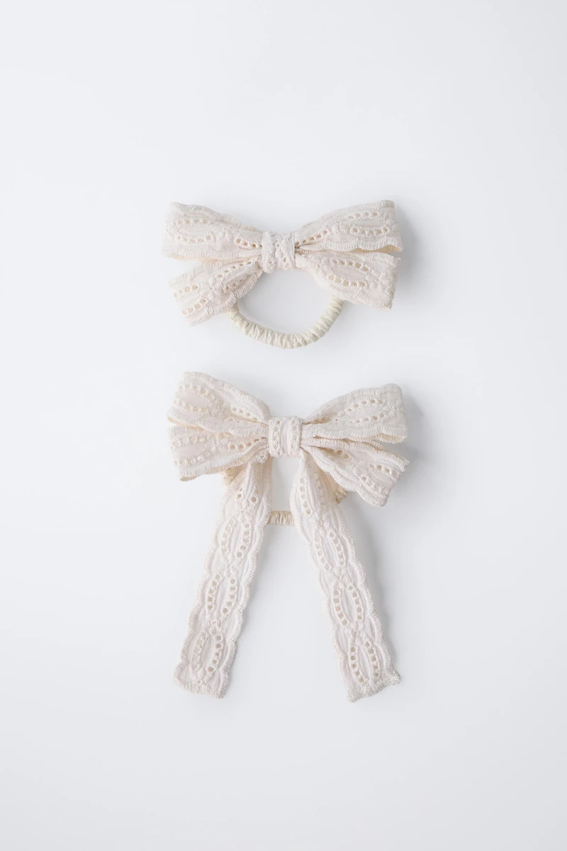 TWO-PACK OF HAIR SCRUNCHIES WITH CUT-OUT BOWS