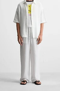 CRINKLED EFFECT PANTS