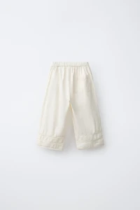 PANTALON À POCHES BRODÉES