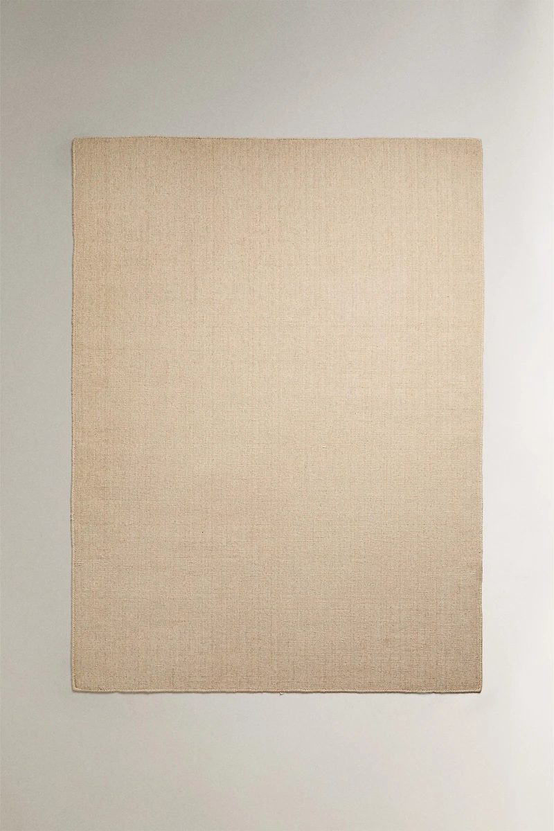 WOOL AREA RUG WITH SCALLOPED LINES