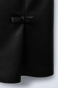 FAUX LEATHER BOW PINAFORE DRESS