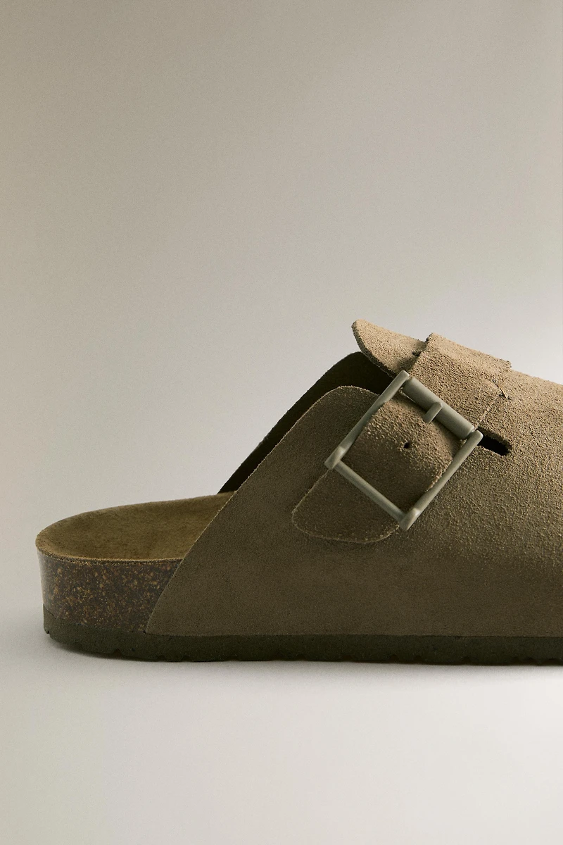 LEATHER MULE CLOG SLIPPERS WITH BUCKLE AND TOPSTITCHING DETAIL