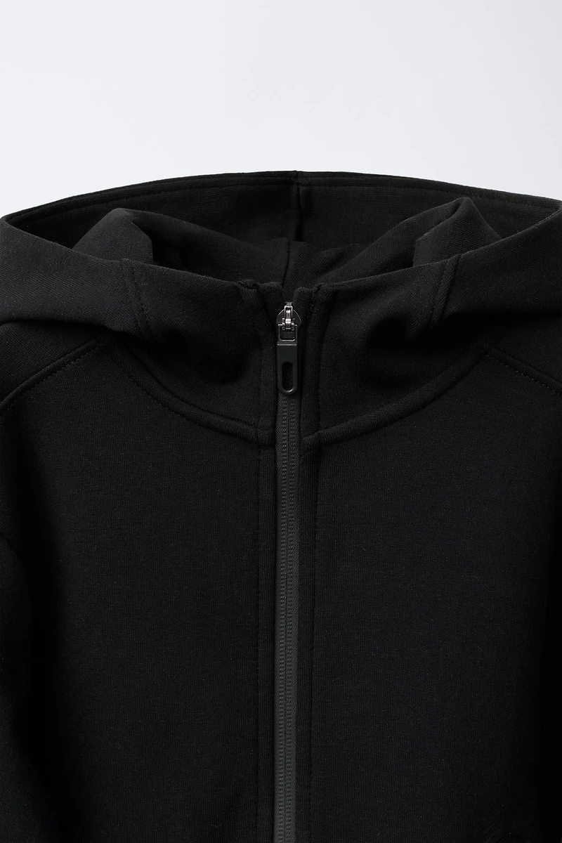 SWEAT ZIPPÉ INTERLOCK SPORT