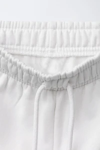 TEXT PRINT WIDE LEG PANTS