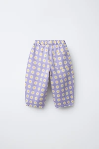 PANTALON EN SERGÉ BALLON À FLEURS
