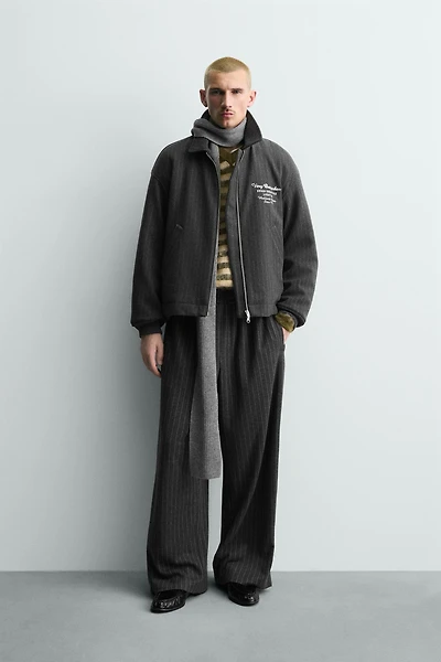 STRIPED BAGGY FIT PANTS