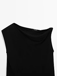 Asymmetric top with knot detail