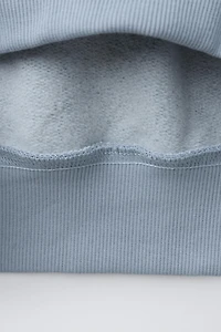FLOCKED TEXT SWEATSHIRT
