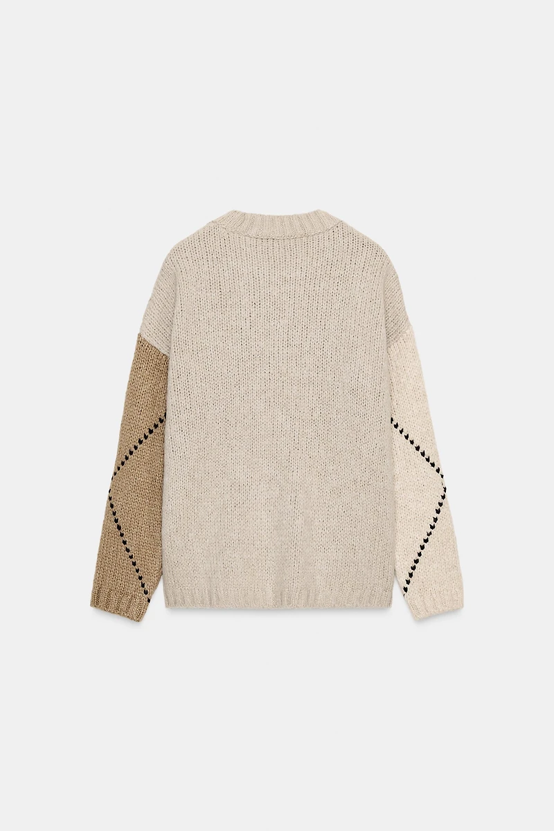 PULL EN MAILLE À LOSANGES