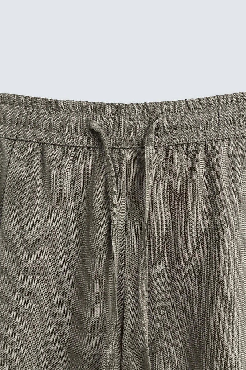 RELAXED FIT FLOWY PANTS